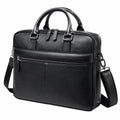 Laptoptasche 40 x 10 x 30 cm aus schwarzem Kunstleder mit Reißverschluss und Schultergurt